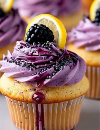 Bursting with Brightness: Lemon Berry Poppy Cupcakes with Blackberry Filling and Purple Frosting