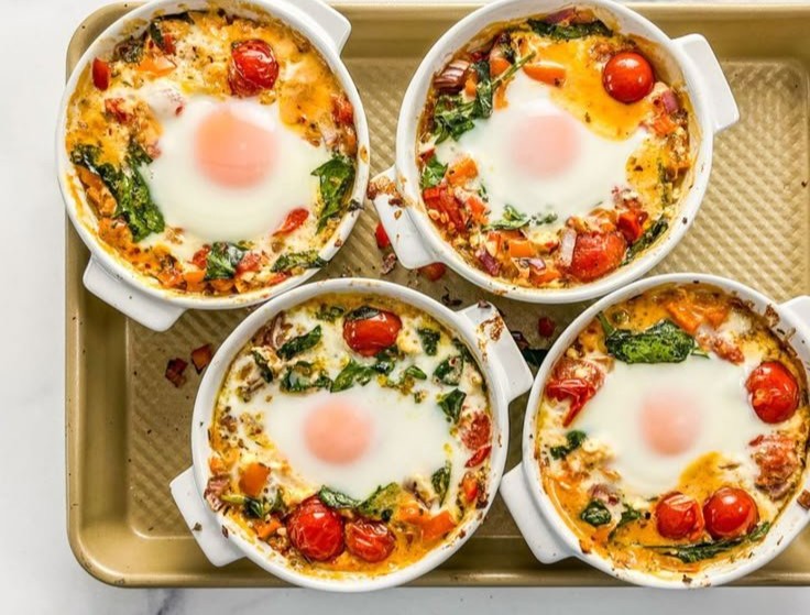 Baked Feta Eggs with Tomatoes and Spinach