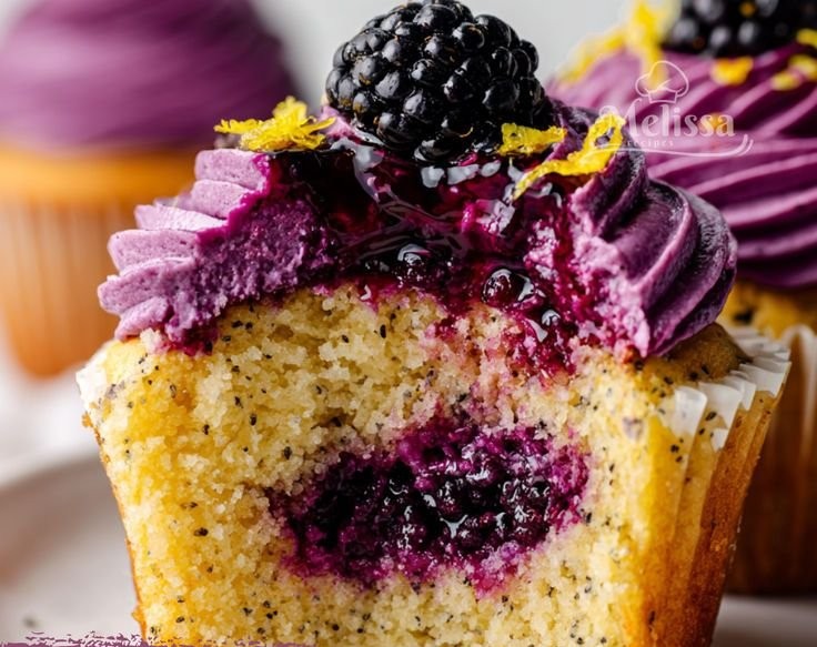 Bursting with Brightness: Lemon Berry Poppy Cupcakes with Blackberry Filling and Purple Frosting