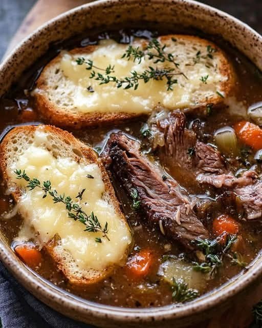 Rich and Tender French Onion Short Ribs with Gruyère Cheese Toast
